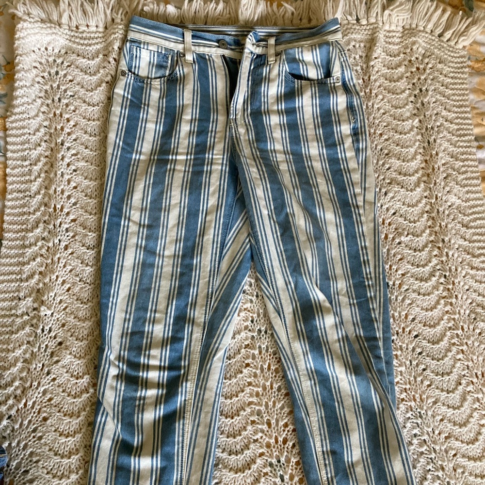 White and Blue stripped pants.